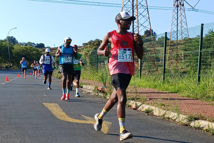 Four participants running the Run Alex 10km