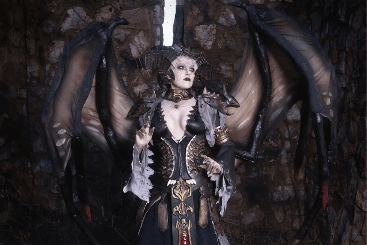 Toonibug cosplays as Lilith from the game Diablo 4. Cosplay with armour and wings. Local professional cosplayer Comic Con winner.