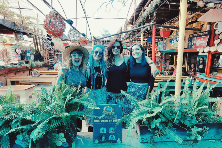 Four women posing at Galpalooza