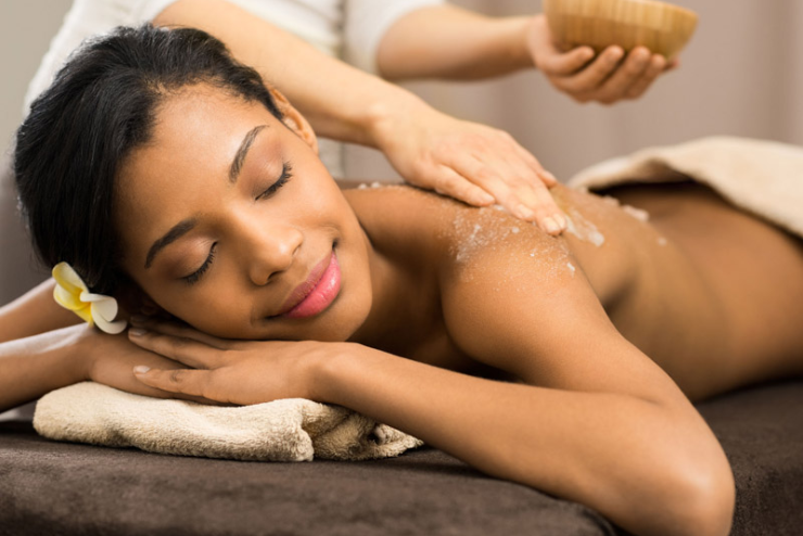 A woman receiving a back massage - do this weekend in Joburg