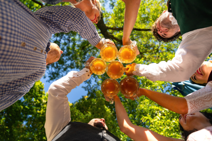 People toasting their beers