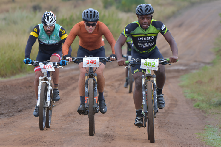 Three mountain bikers on a trail